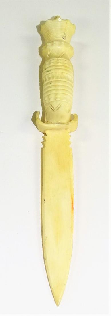 VINTAGE INUIT CARVED BONE LETTER OPENER: All hand carved with a crown handle. Measures just under 7" long. Third party shipping or local pick up required. Local recommendations will be provided on final invoice.