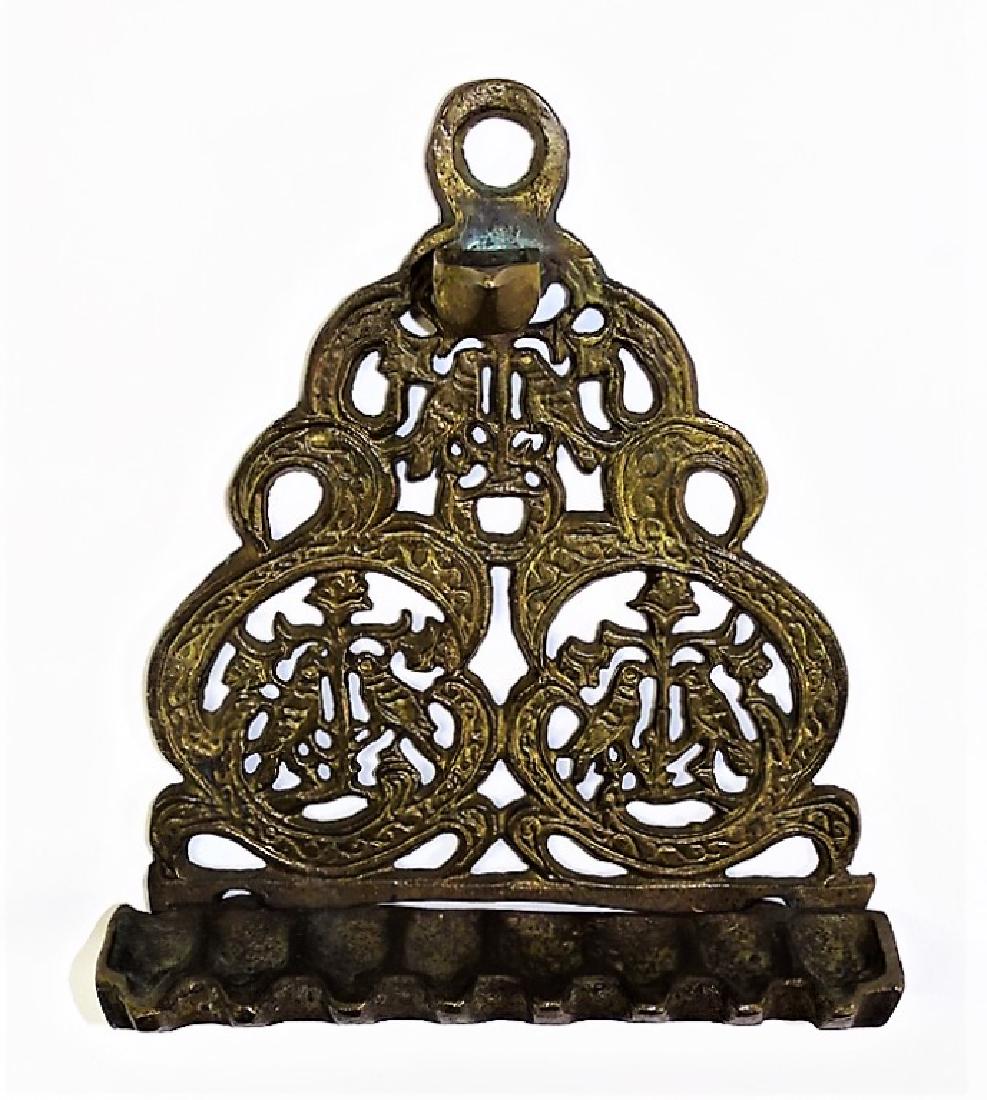 ANTIQUE 20TH C. HUMMMING BIRD MENORAH: Measures 7" tall x 6" wide. Dates to the mid 20th century. Third party shipping or local pick up required. Local recommendations will be provided on final invoice.