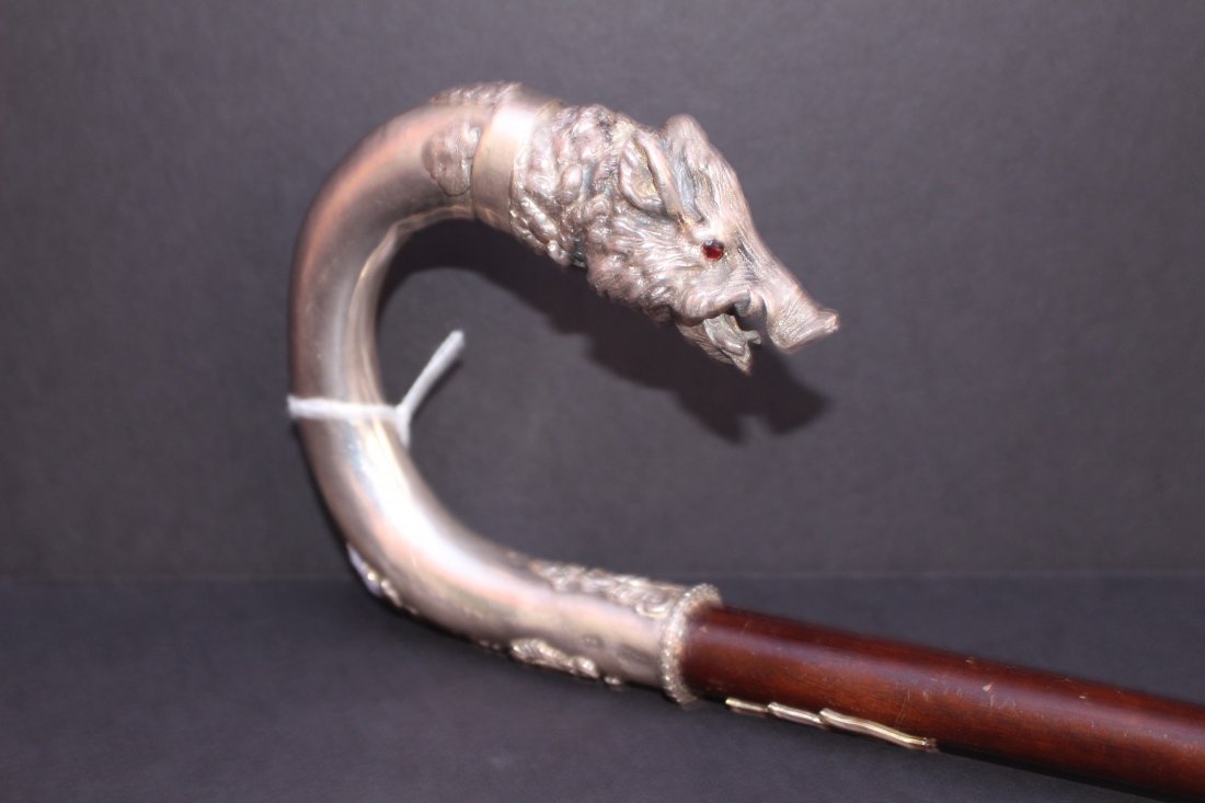IMPORTANT RUSSIAN STERLING HANDLED WALKING STICK: Boars head handle, red glass or ruby eyes. Measures 35" in length. Marked 84 for Russian silver. Bears the initials GO for the maker. Monogramed in sterling rare find Shipping U.S. to be $65 plus ins