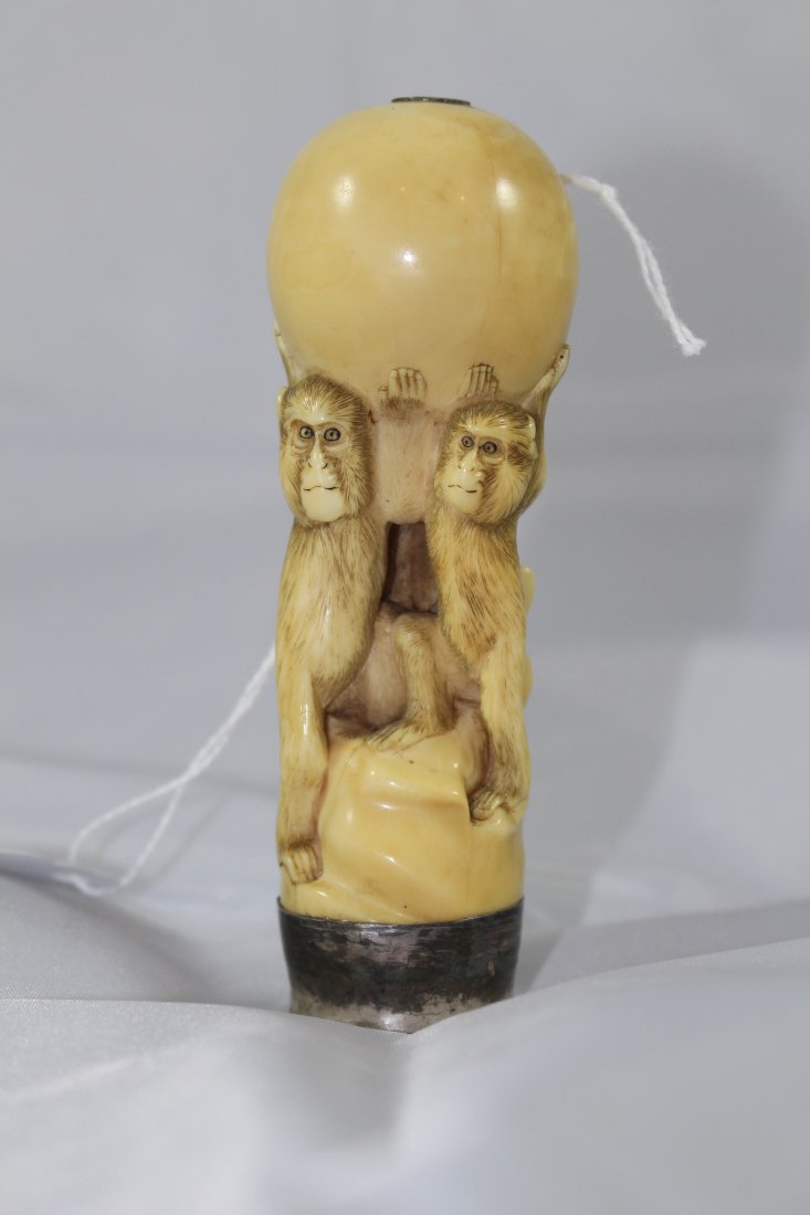 ANTIQUE CHINESE IVORY MONKEY & STERLING CANE HANDLE: Dates to the late 19th century, depicting 3 monkeys holding up the world, with a sterling silver base. Stands 4 1/2" tall we do NOT condone the sale of endangered animals, this item was imported legal