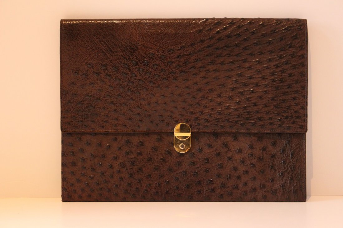 OSTRICH LADIES PORTFOLIO BY MADLER OF GERMANY: One of the leading makers of brief cases and portfolios in the world. 100% Ostrich measures 14" wide. Original cost just under $2500 Shipping U.S. TO BE $45 PLUS INS