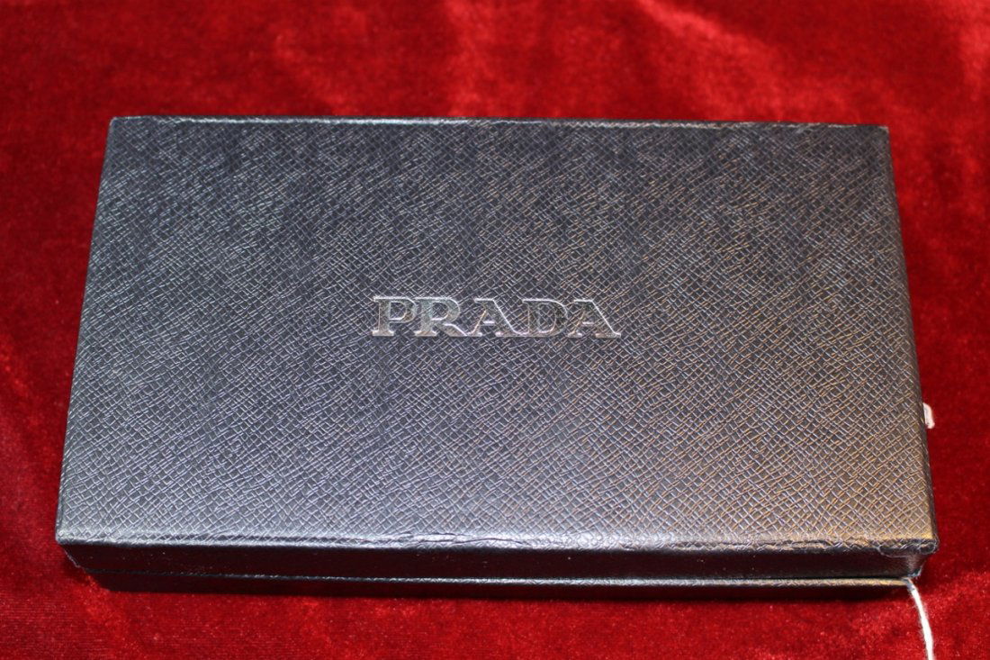 PRADA NEW IN BOX LADIES WALLET: Measures 7\" long, comes with original box and sleeve, also papers, shipping $20 plus Ins
