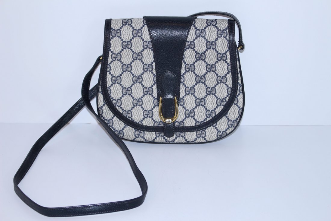 GUCCI LEATHER AND CANVAS BLACK COLOR BAG: From a prominent Palm Beach estate, measures 9" across,BLACK leather, shipping U.S. $35 plus ins
