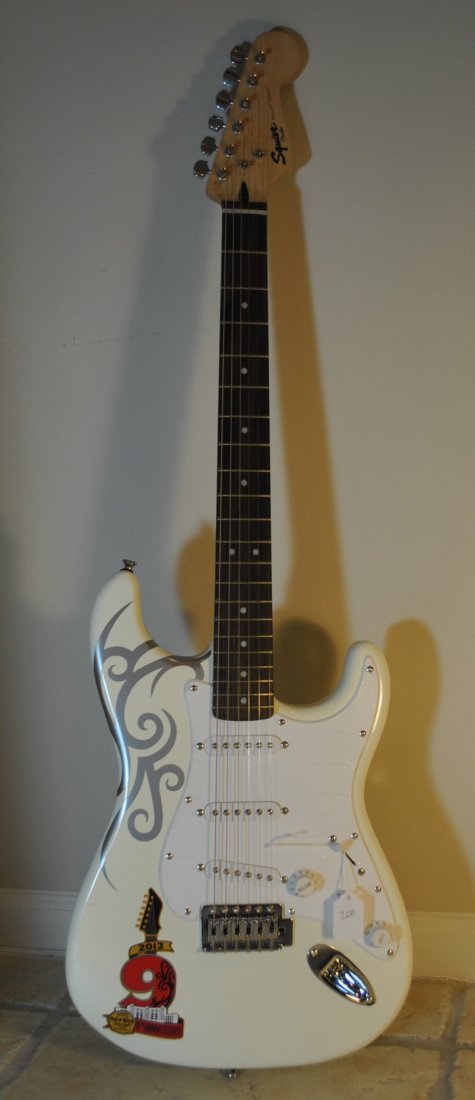 SQUIER STRAT BY FENDER GUITAR WHITE: SQUIER STRAT BY FENDER GUITAR, FROM A BOCA RATON ESTATE COMES WITH BLACK CANVAS CASE, MEASURES 39" LONG shipping U.S. $75 plus ins