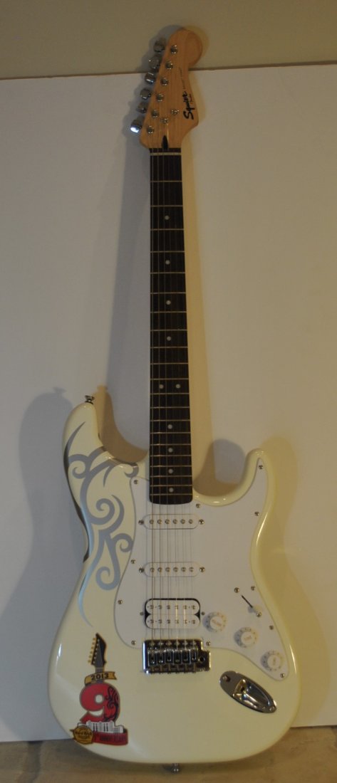 SQUIER STRAT BY FENDER GUITAR WHITE: SQUIER STRAT BY FENDER GUITAR, FROM A BOCA RATON ESTATE COMES WITH BLACK CANVAS CASE, MEASURES 39\\\" LONG shipping U.S. $75 plus ins