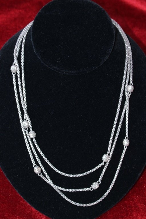 JUDITH RIPKA STERLING AND TRIPLE STRAND NECKLACE: 16" long, with a total weight of 57 grams from a Miami Beach estate, shipping U.S. $20 plus ins
