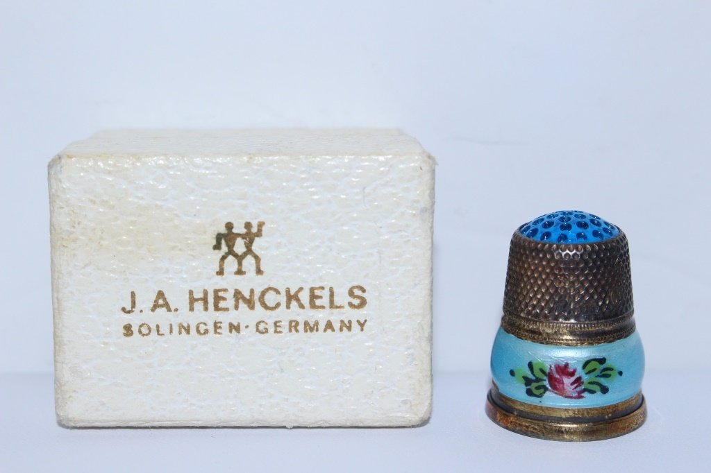 ANTIQUE GERMAN ENAMELED OVER SILVER THIMBLE: From J.A. Henckles solingen Germany. marked 925, floral enameled trim,excellent condition Shipping $20 U.S. plus ins