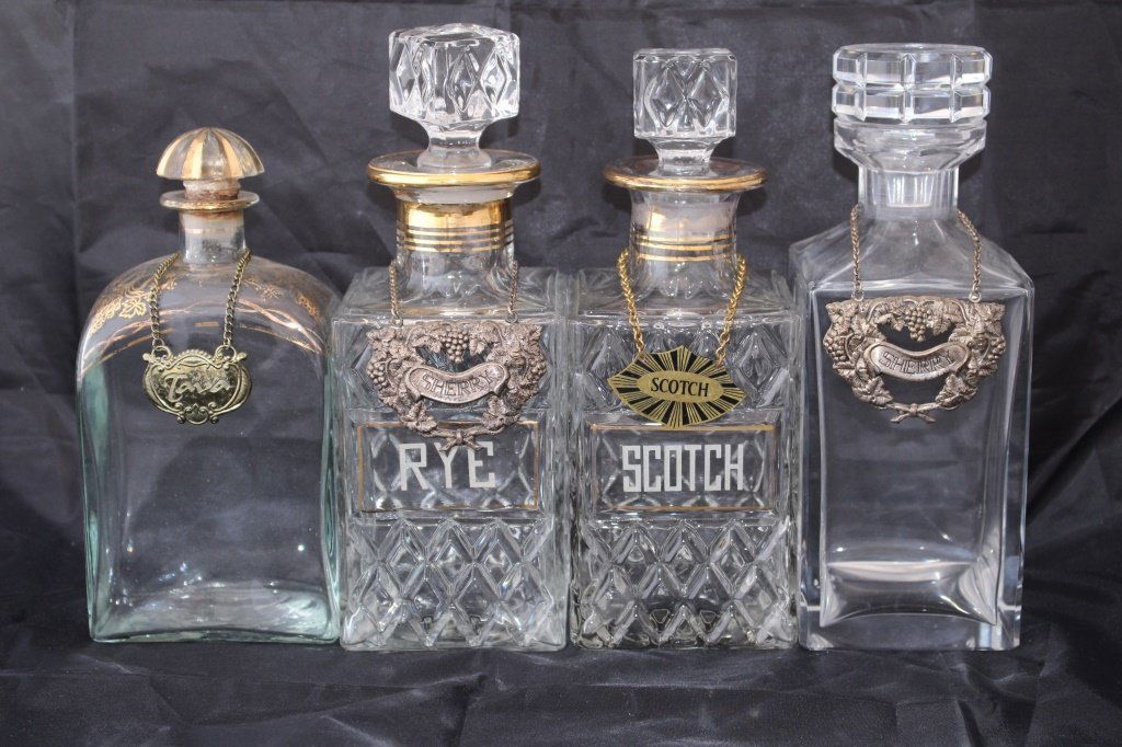 COLLECTION OF 4 CRYSTAL LIQUOR DECANTERS W STOPPER (1 of 5)