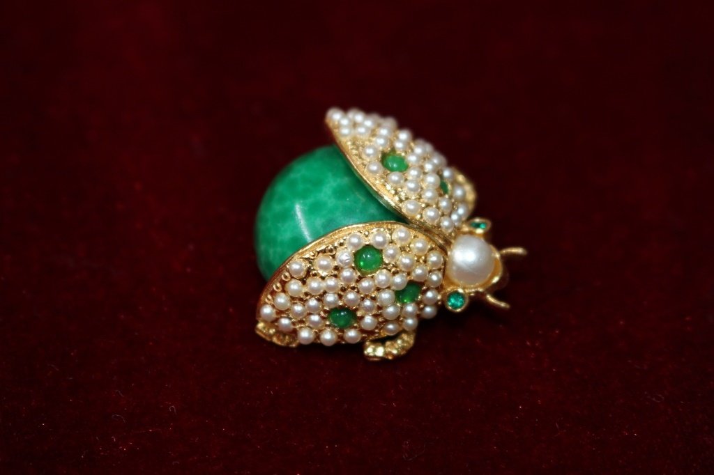SIGNED VINTAGE HATIE CARNEGIE BEETLE BROOCH: Signed to base. Measures 1'' Long. Total weight 12 grams. Shipping inside the U.S. to be $20 plus insurance.