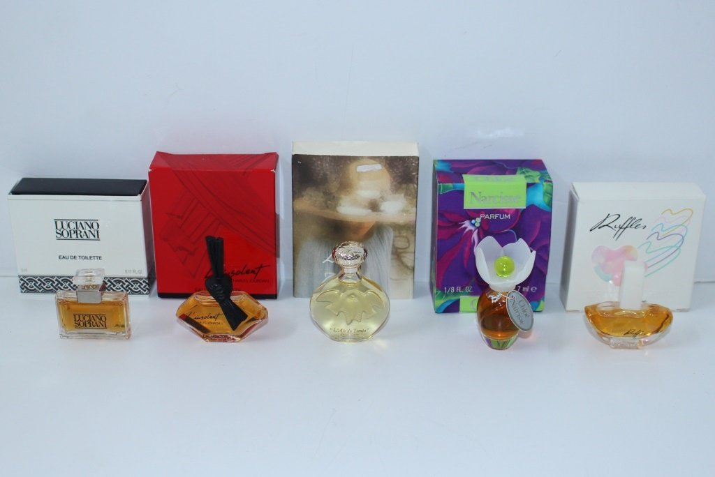LOT OF 5 MINIATURE PERFUME BOTTLES WITH BOXES: all intact most never opened from a Miami Beach collector, to include,L'insolent by charles Jourdan toilette3.75ml, Lair du Temps 6ml by Nina Ricci, ruffles by oscar de larenta toilette,Narcisse by Ch