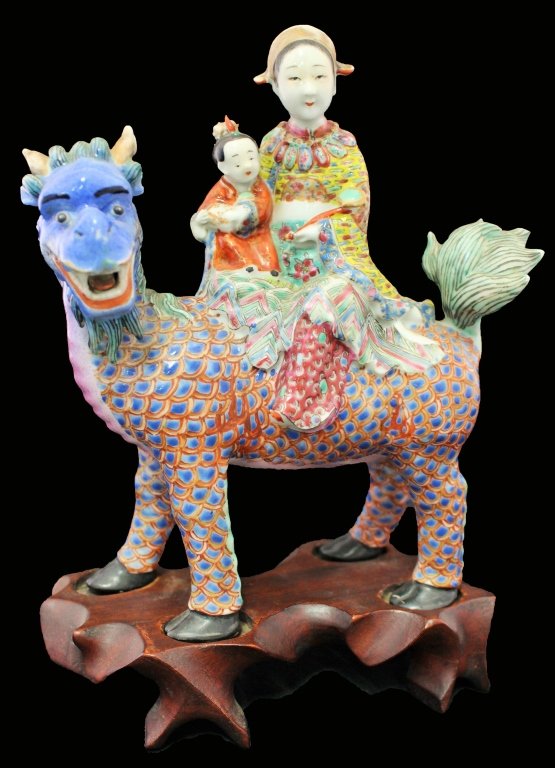 CHINESE REPUBLIC LARGE FAMILLE ROSE WOMAN & DRAGON: Measures 8 1/2" tall, comes with an original fitted base, depicts a woman and child sitting atop a dragon. good conditiona few small chips. shipping u.s to be $35 plus ins