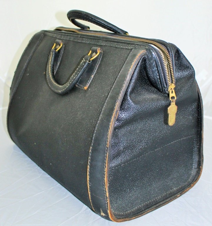 ANTIQUE SWISS MADE LEATHE DRS BAG: Measures 14" wide and 11" tall, in good condition. shipping $35 plus ins u.s.