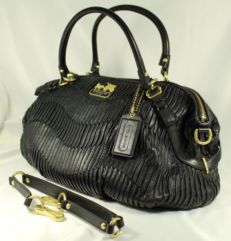 Black and gold online coach bag