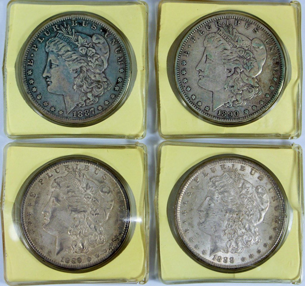 4 MORGAN DOLLAR SILVER COINS (1 of 2)
