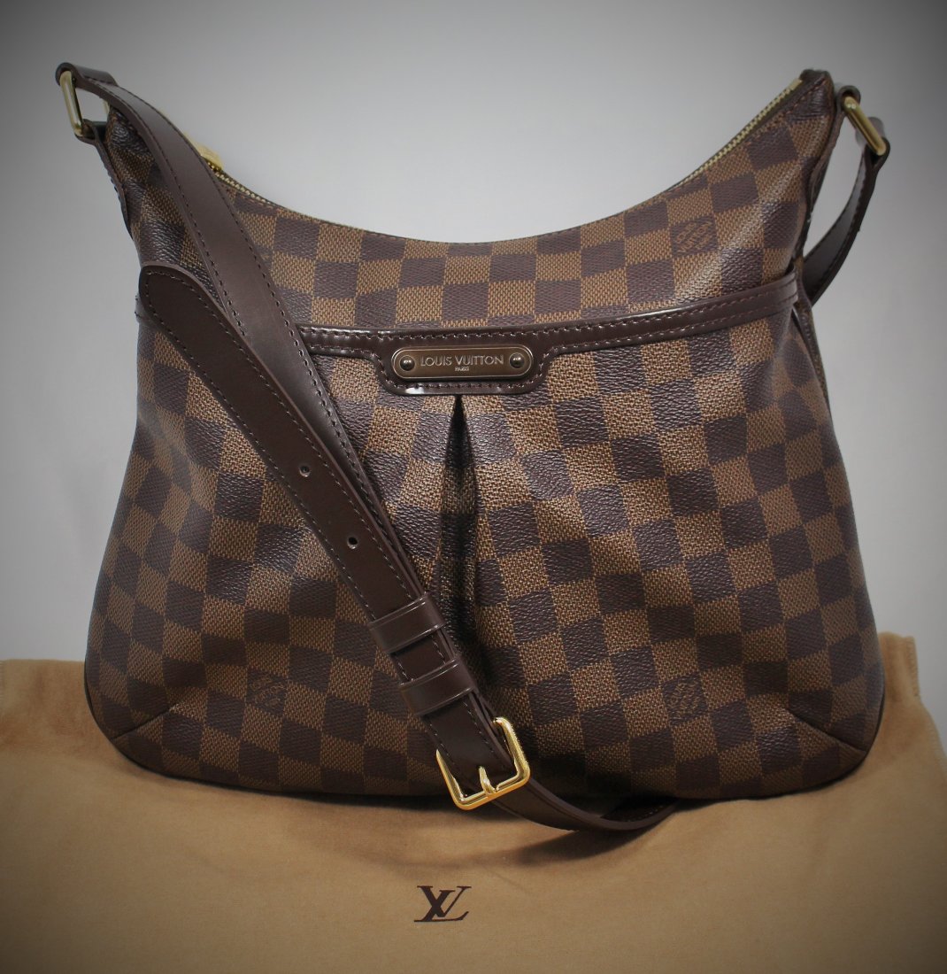 LOUIS VUITTON BLOOMSBURY DAMERIA PURSE: Brown-finish engraved Louis Vuitton Inventeur plate, interior flat pockets, outside pocket with magnetic closure, an adjustable strap with original dust bag. Will ship for $40 U.S. plus insurance.
