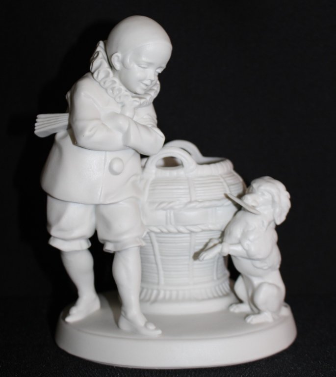 ANTIQUE PARIAN CLOWN & HIS DOG: Parian antique figure of a clown and his dog. Measures approx 7' high x 5' wide. Will ship for $35 U.S. plus insurance.