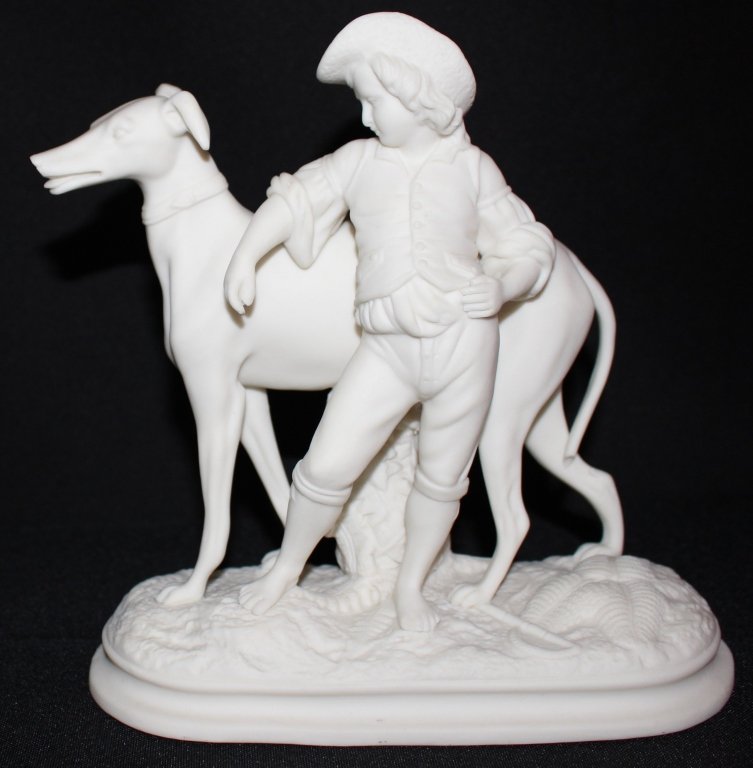 ANTIQUE PARIAN FIGURE BOY & HIS DOG: White matte finish a boy leaning on his large dog. Measures approx 7" tall x 7 1/2 " long. Will ship for $30 U.S. plus insurance.