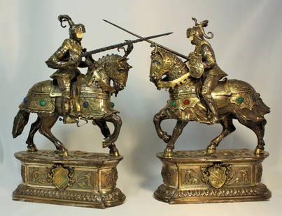 PAIR OF LARGE ENGLISH STERLING KNIGHTS WITH JEWELS: Extraordinary pair of solid sterling knights on horse back, and bases. They each measure 12 1/2" tall x 8" wide. Superior detail given to the silver work. Each horse is decorated with cabochon