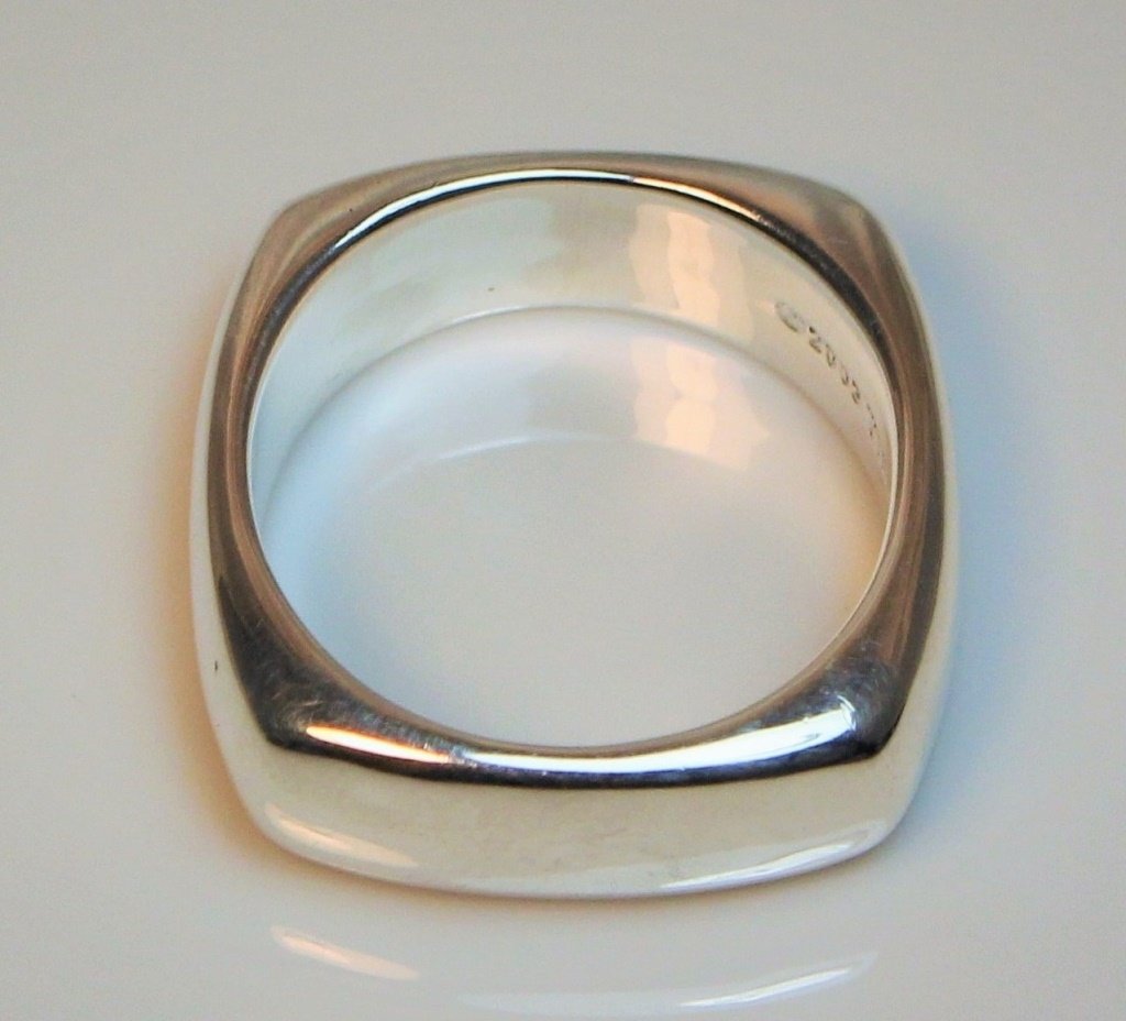 TIFFANY & CO. STERLING SILVER 2003 RING: Size 9. Total weight 10.5 grams. Shipping $20 plus insurance.