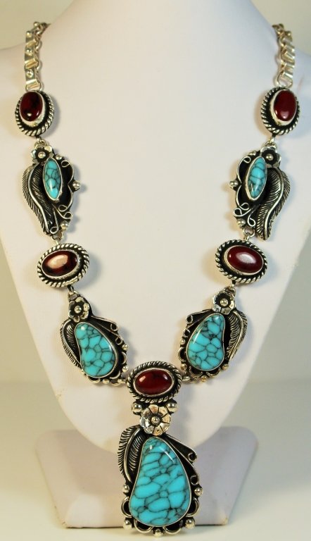 NAVAJO STERLING TURQUOISE CARNELIAN NECKLACE: Measures 18" long. Made in Mexico. Signed Navajo. Total weight of 87 grams. Shipping to be $20 plus insurance.