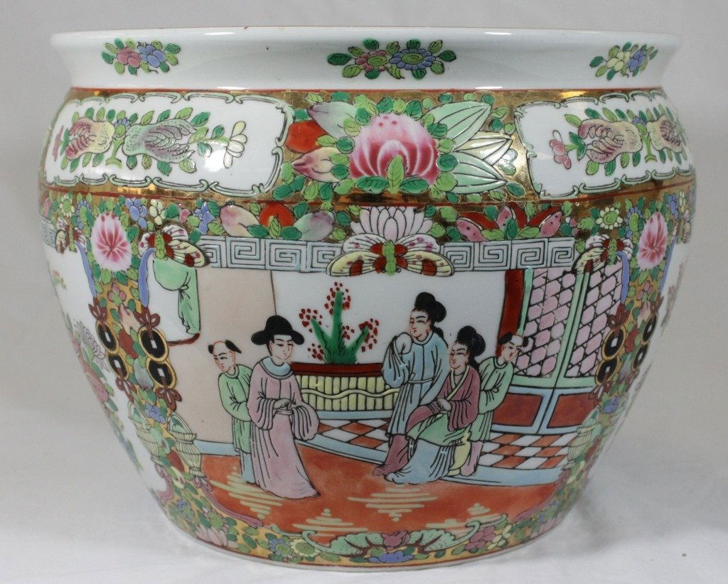 CHINESE FAMILLE ROSE PLANTER: Chinese famille rose planter with hand painted with elders and floral design inside of bowl is bubble eye gold fish. Measures approx 8" tall. Will not ship can refer our local shippers.