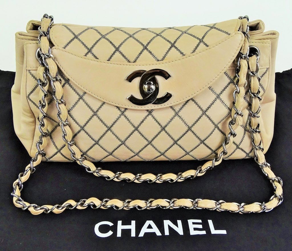 WOMANS CHANEL LAMB SKIN AND METALLIC BAG (1 of 4)