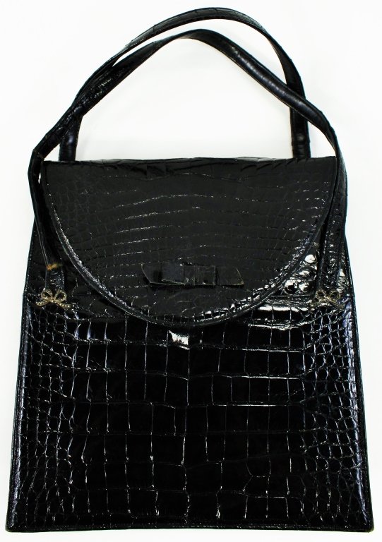 CLASSIC BLACK LUCILLE DE PARIS ALLIGATOR HANDBAG: 1950's- 1960's Marcasite bow design. Measures 8 1/4" wide x 8 1/2" tall. Referred local shippers.