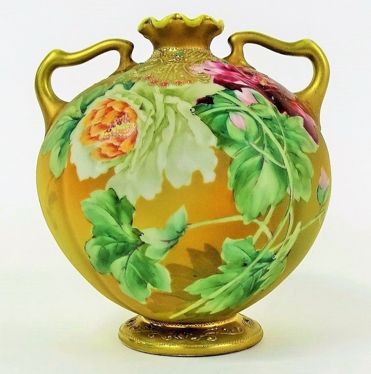 ANTIQUE HAND PAINTED NIPPON ROUND VASE WITH ROSES: Blue mark to base. Dates to the early 20th century. Measures 7 1/2" tall. In excellent condition. We will NOT ship but can refer local shippers.