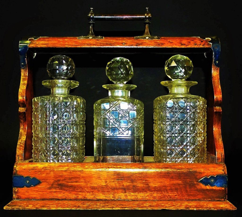 ANTIQUE ENGLISH 3 BOTTLE LOCKING TANTALUS (1 of 2)