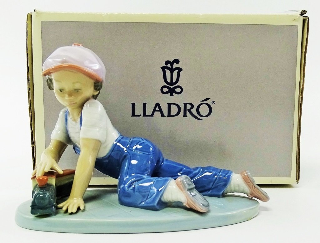 LLADRO #7619 'ALL ABOARD' PORCELAIN FIGURE (1 of 2)