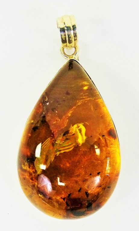 LARGE ANTIQUE AMBER TEAR DROP MOUNTED IN STERLING (1 of 2)