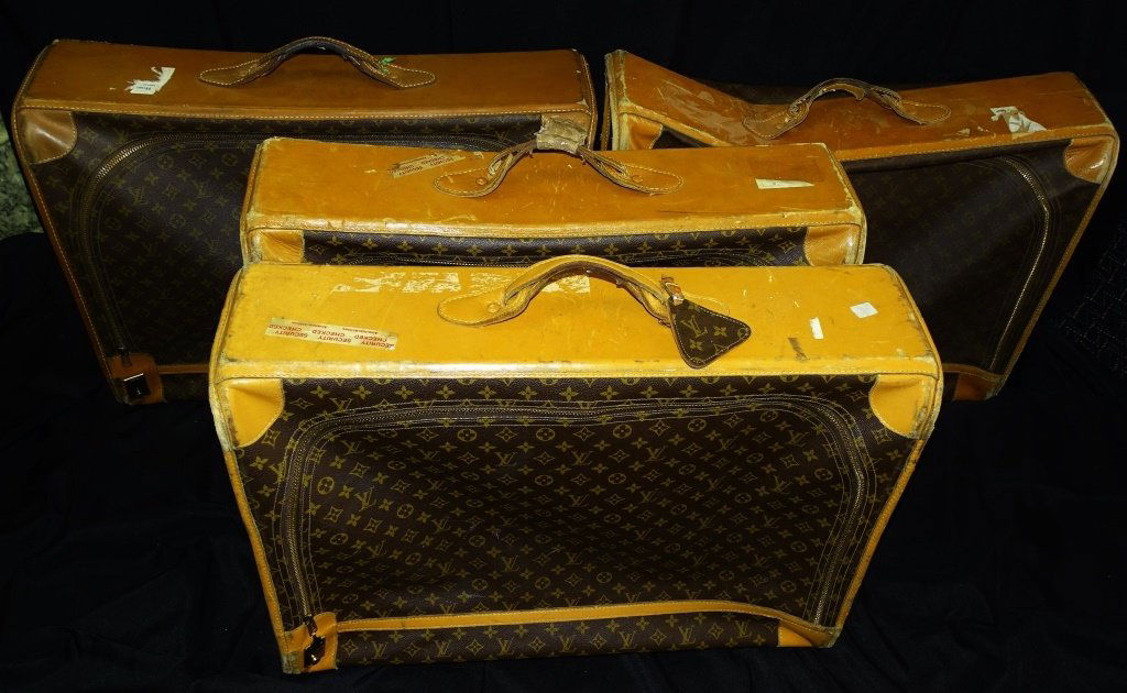 FOUR LARGE VINTAGE LOUIS VUITTON SUITCASE (1 of 5)