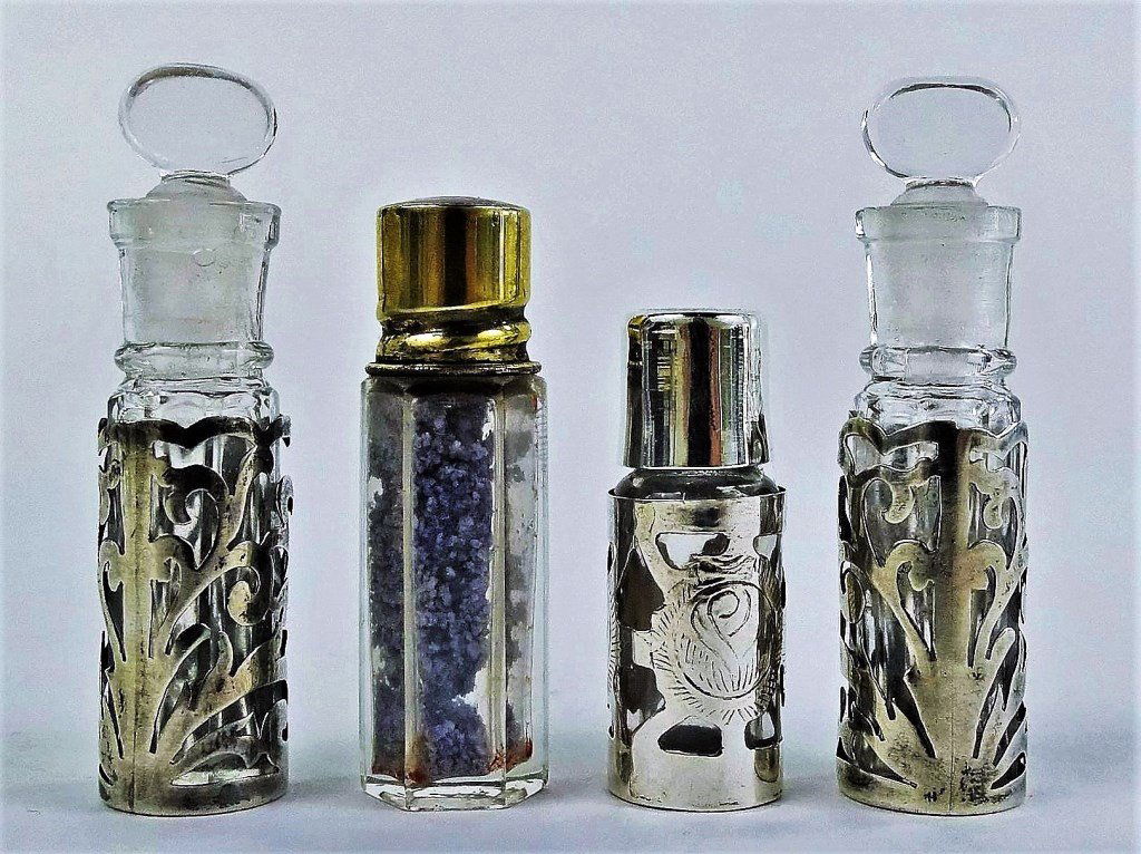 FOUR VINTAGE PERFUME BOTTLES SILVER OVERLAY (1 of 2)