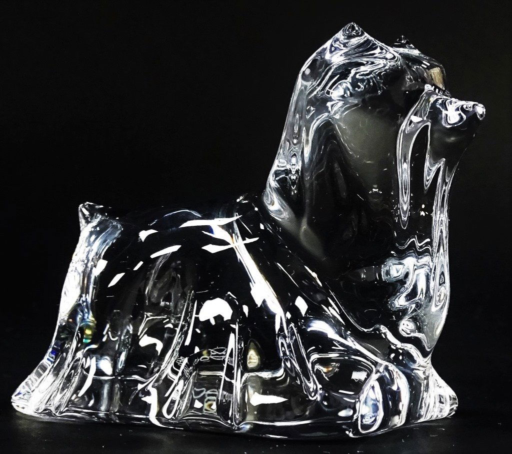 BACCARAT FRANCE MOLDED CRYSTAL YORKSHIRE FIGURE: Baccarat French molded crystal figure of a standing Yorkshire Terrier. Etched Baccarat signature to right side and stamped seal to base. Sits approx. 3 1/4" high x 4 1/4" length x 2" width. Shipping t