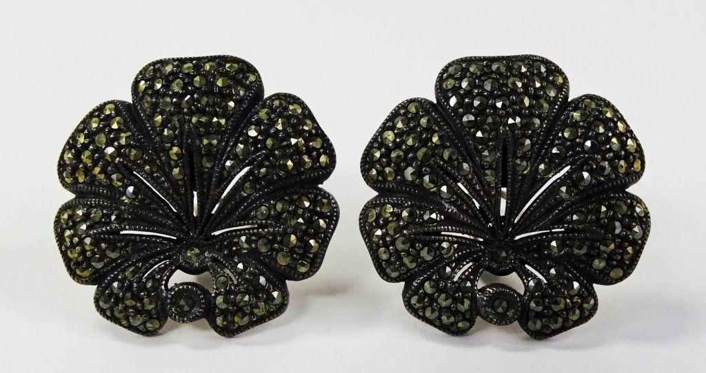 PR VICTORIAN HANDSET MARCASITE & SILVER EARRINGS: Pair of ladies Victorian era post back earrings designed in floral form, comprised of Sterling Silver, and handset with a multitude of Marcasite accent stones. Each marked "Sterling". Earrings measure