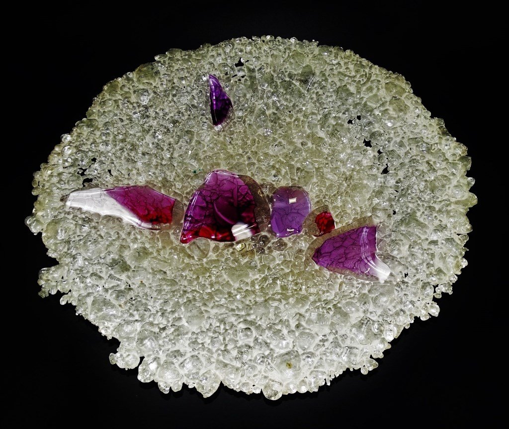 C. NICHOLS CONTEMPORARY CHIPPED ICE ART GLASS BOWL: Caleb Nichols (American, 20th); A large contemporary studio art glass centerpiece bowl executed in what is referred to as "Chipped Ice" patterned glass in a clear frosted color, adorned with smooth se