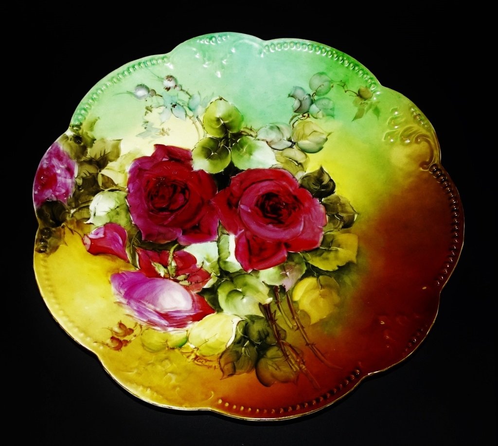 LIMOGES FRANCE HAND PAINTED PINK ROSE CHARGER: Limoges France hand painted pink rose charger all hand painted beautiful colors and floral. Measures approx 13 " long. Will not ship can refer local shippers.