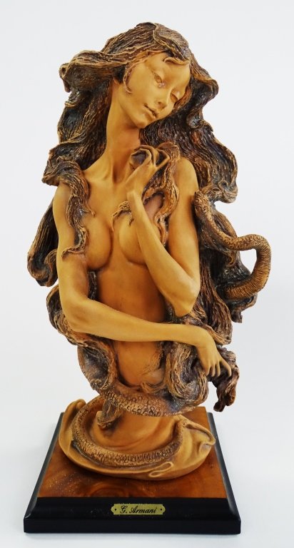 GIUSEPPE ARMANI FIGURINE EVE & THE FORBIDDEN FRUIT: Giuseppe Armani figurine of a nude Eve holding the Forbidden Fruit. Measures approx 13 " tall. Will not ship can refer local shippers.