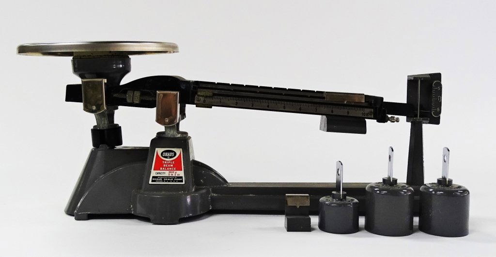 VINTAGE 1950-60S OHAUS TRIPLE BEAM BALANCE SCALE: Vintage 1950-60s Ohaus triple beam balance scale. Measures approx 14 " long x 6 1/2 " tall. Will not ship can refer local shippers.