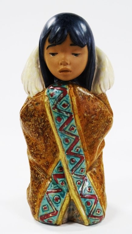 LLADRO PORCELAIN FIGURE "ARTIC WINTERS" FIGURINE: Lladro porcelain figurine titled "ARTIC WINTERS" figure which depicts an Inuit girl wrapped in a coat with a fur collar together. Measures approx 8' tall. Will not ship can refer local shippers.