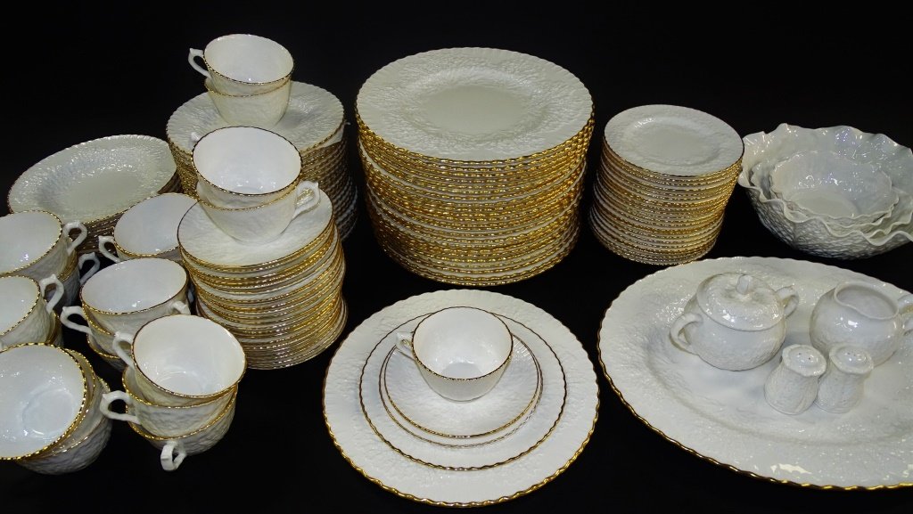 132PCS SPODE 'SAVOY' ENGLISH BONE CHINA DINNEWARE: Dinner service for 24 of Spode English Bone China Porcelain. Decorated in the 'Savoy' pattern with embossed cabbage leaf motif and gold trim. 6 piece place setting comprised of; (24) 10-1/2" Dinner Pl