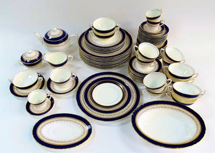 77PCS ROYAL WORCESTER PORCELAIN DINNERWARE: 77 piece service of Royal Worcester English Porcelain dinnerware. In the 'Regency' pattern, with cobalt blue bands and gilt decoration on white ground. Comprised of; (12) 10-3/4" Dinner Plates, (7)