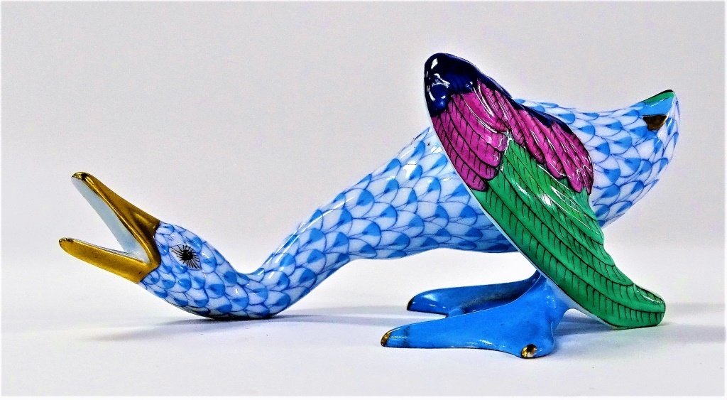 HEREND HUNGARIAN PORRCELAIN FISHNET GOOSE: Herend Hungarian porcelain figure in the form of a Goose with neck outstretched and bill wide open. Hand-painted in 'Fishnet' pattern with Blue color. Gold gilt accent to bill, tail feathers, and feet