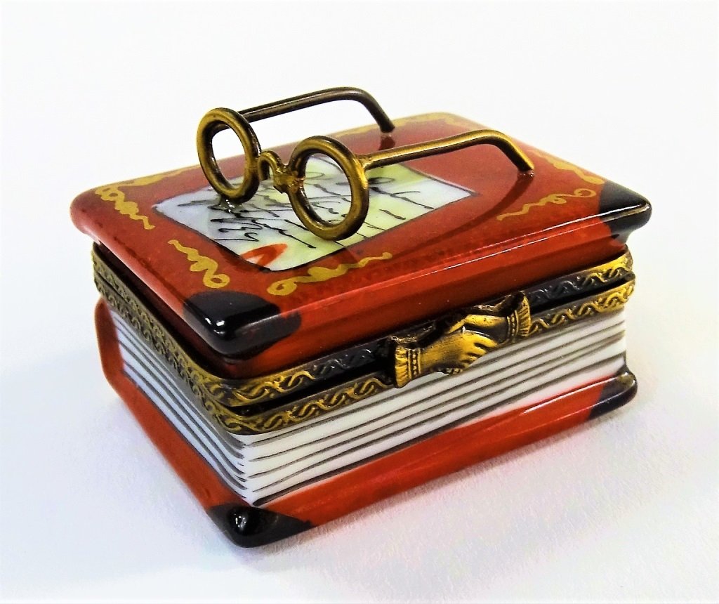 LIMOGES FRANCE PILL BOX ROCHARD BOOK/GLASSES: Measures 2" long. shipping $20 u.s. plus ins in like new condition