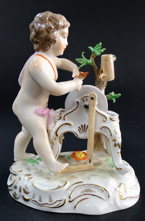 DRESDEN PORCELAIN CUPID SHARPENING HIS ARROW (1 of 3)