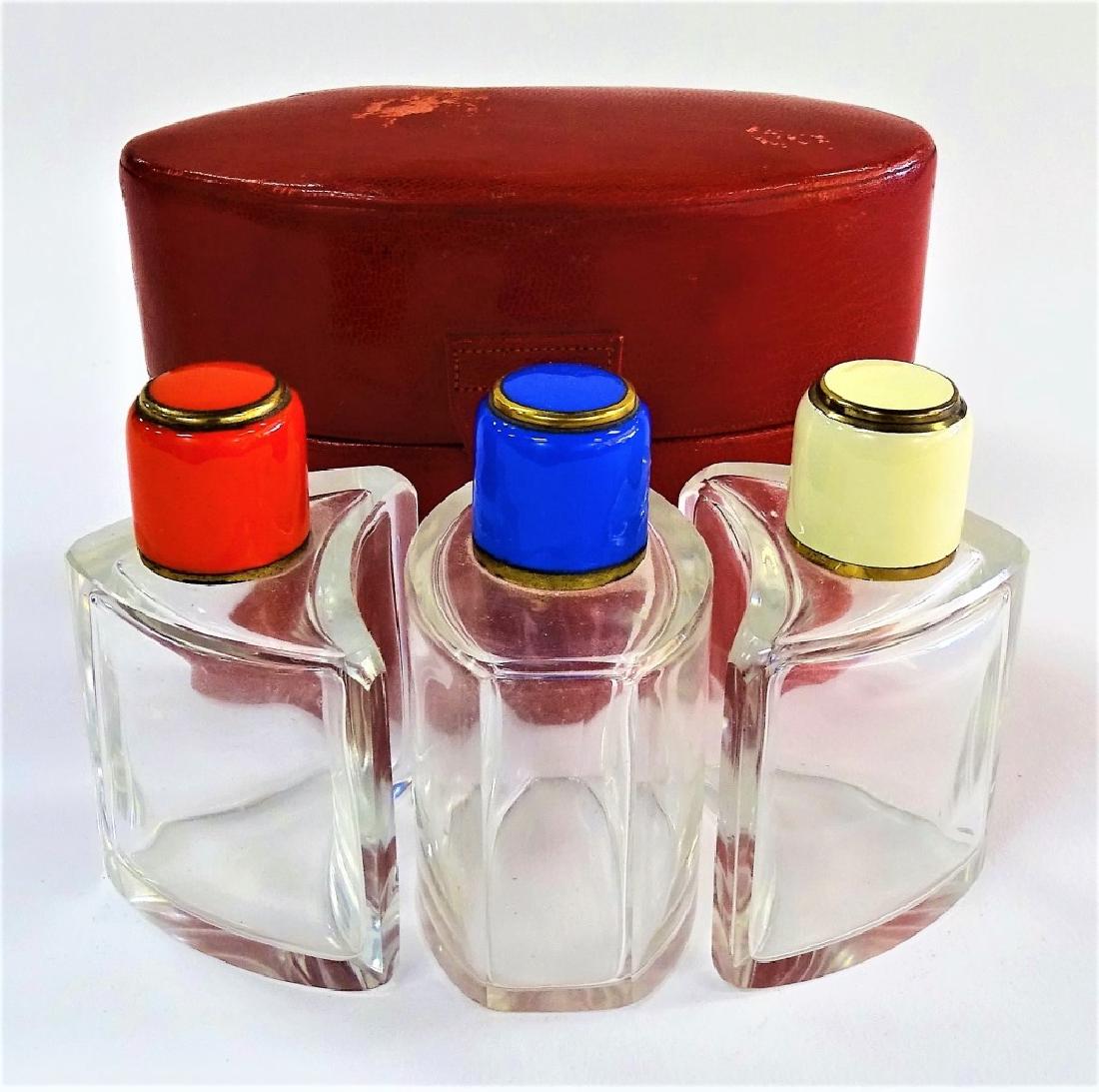 3 CRYSTAL SCENT BOTTLES WITH ENAMELED TOPS IN CASE (1 of 3)