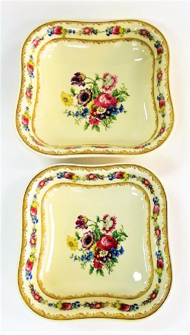TWO HUTSCHENREUTHER BAVARIAN PORCELAIN DISHES: Pair of mid 20th century Hutschenreuther Bavarian porcelain serving dishes made in Selb, Germany. Decorated throughout with transfer printed florals and sepia colored bands. Both in square shape, the 