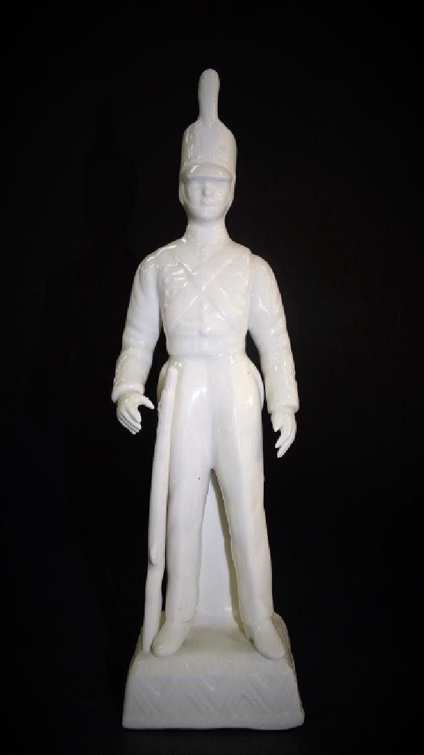 VINTAGE CAPODIMONTE WHITE GLAZED SOLDIER FIGURINE: Vintage Capodimonte white glazed soldier figurine, marked to bottom. Measures approx 10 " tall. Will not ship can refer local shippers.
