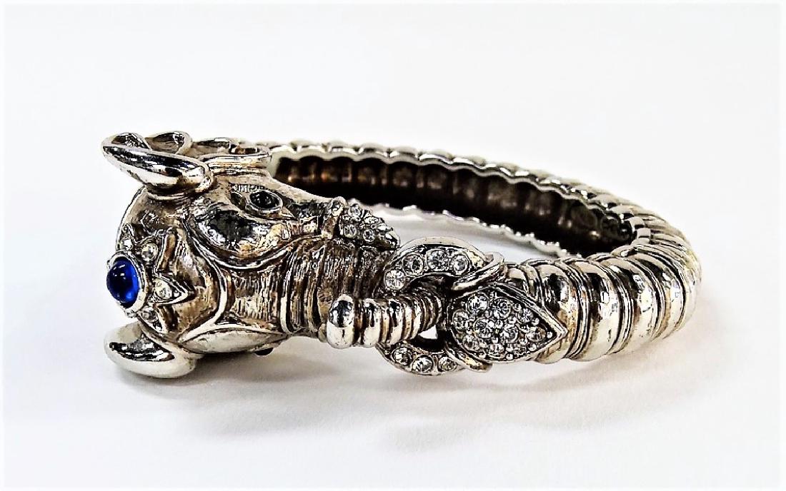 KENNETH J LANE FABULOUS VINTAGE ELEPHANT BRACELET: Signed KJL with blue stone on head, and 2 black glass eyes , shipping $20 plus ins u.s.