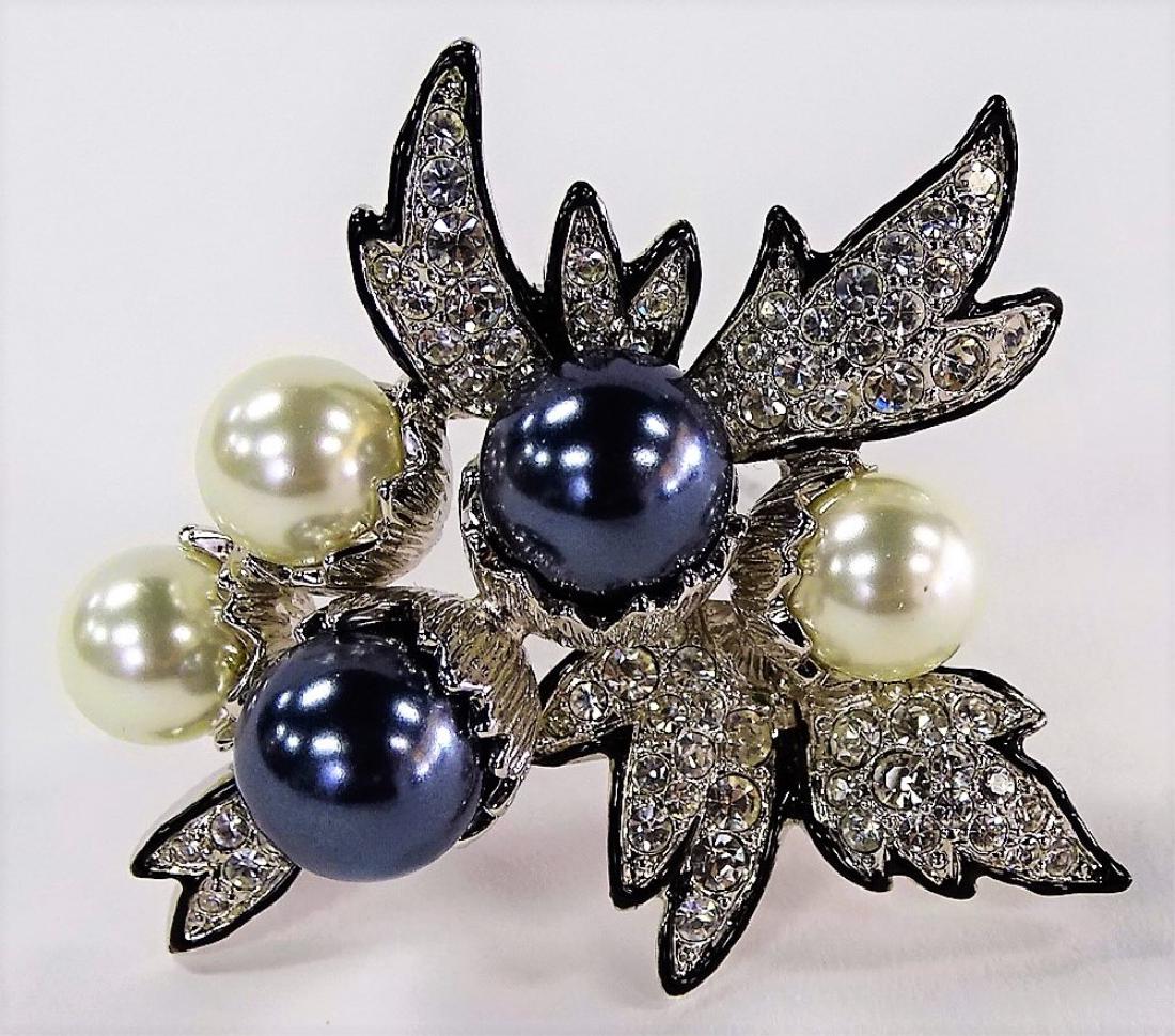 VTG KENNETH JAY LANE COSTUME JEWELRY BROOCH: Vintage high fashion costume jewelry brooch by KJL designers. Adorned with four Pearls and encrusted with a multitude of clear colored Rhinestones. Shipping to be $20 + insurance in US.